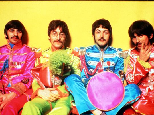 The Beatles as "Sgt. Pepper's Lonely Hearts Club Band."