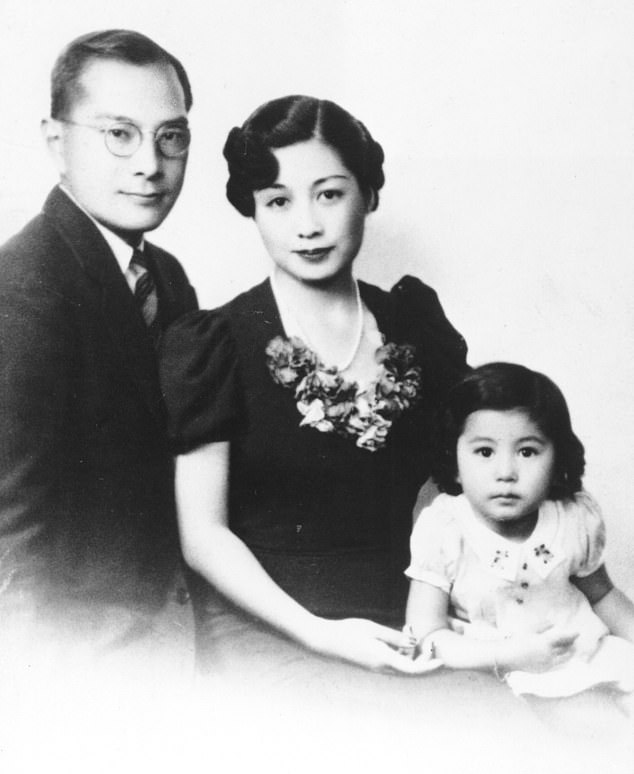 Yoko, seven years John's senior, was born in Tokyo, her father a wealthy banker and a Christian, her mother a Buddhist. When her father was posted to a position in the U.S. and the family moved to Scarsdale, New York. Pictured: Yoko aged two with her parents in 1935