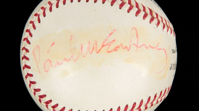 A baseball signed by The Beatles and given to Mike Murphy