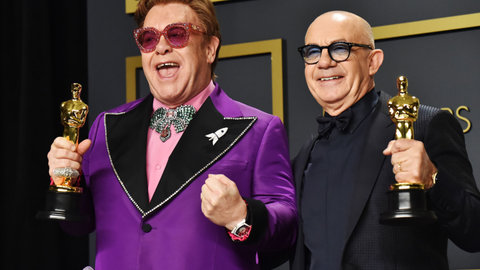 Elton John and Bernie Taupin, winners of the Original Song award for "(I&#39;m Gonna) Love Me Again" from "Rocketman," pose in the press room during the 92nd Annual Academy Awards at Hollywood and Highland on Feb. 9, 2020 in Hollywood, Calif.