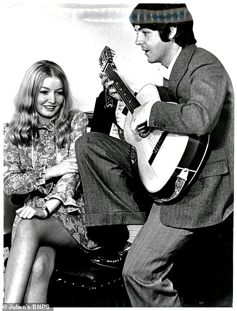 Classical guitar used by McCartney (pictured)  is tipped to sell for £5,000. It's among 300 items of Beatles memorabilia that are coming up for auction online