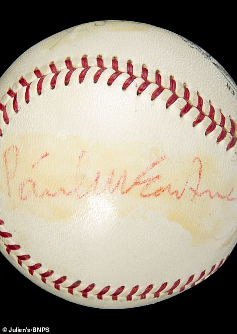 A baseball signed by all four Beetles on different sides has an $80,000 to $100,000 estimate