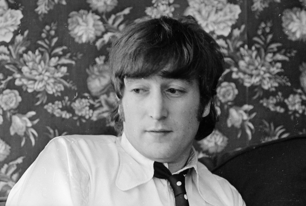 John Lennon in a shirt and tie
