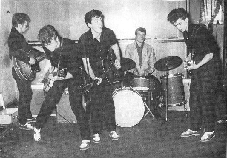 The 'Fab Five' line-up including Stuart Sutcliffe and Pete Best with old Teddy Boy haircuts